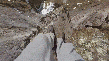 Person jumping off cliff