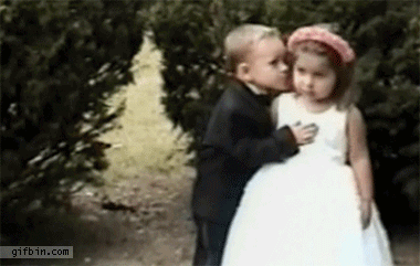 Kids dressed up like bride and groom