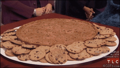 Cookie monster gazes upon giant cookie plate 