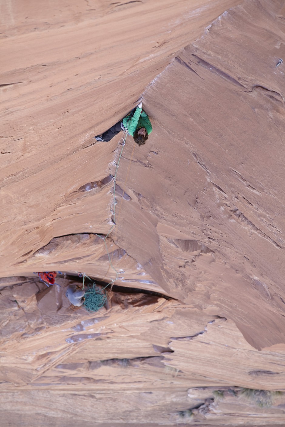 katie lambert leads pitch 5 of moonlight buttress.  the first f the sustained dihedral pitches leading off the "rocker blocker"  of moonlight buttress, zion national park