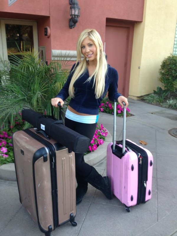 Tasha with her suitcases