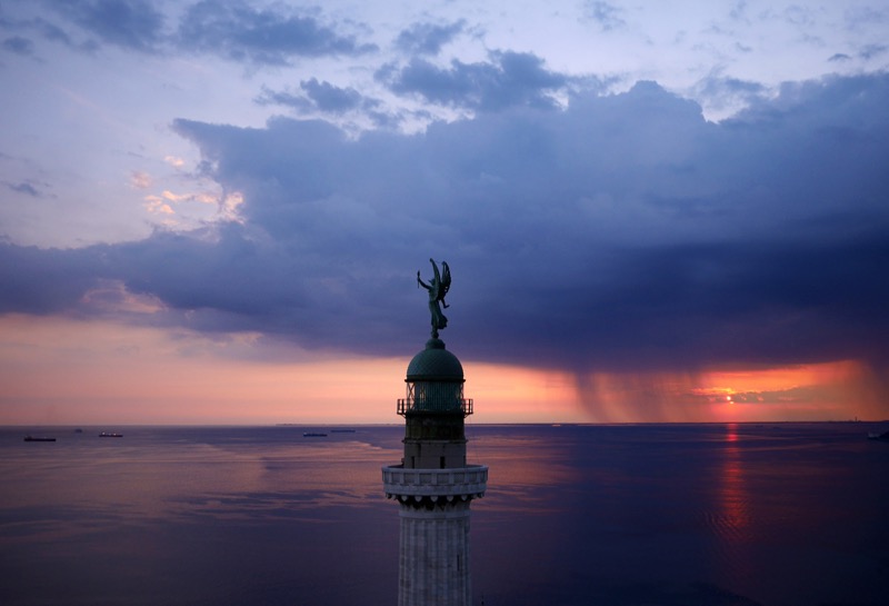 The Vittoria Light, overlooking the Gulf of Trieste at sunset.