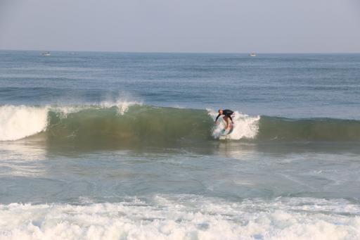 Photo: Taha rides the waves in Gaza. Laura Dean/Global Post 