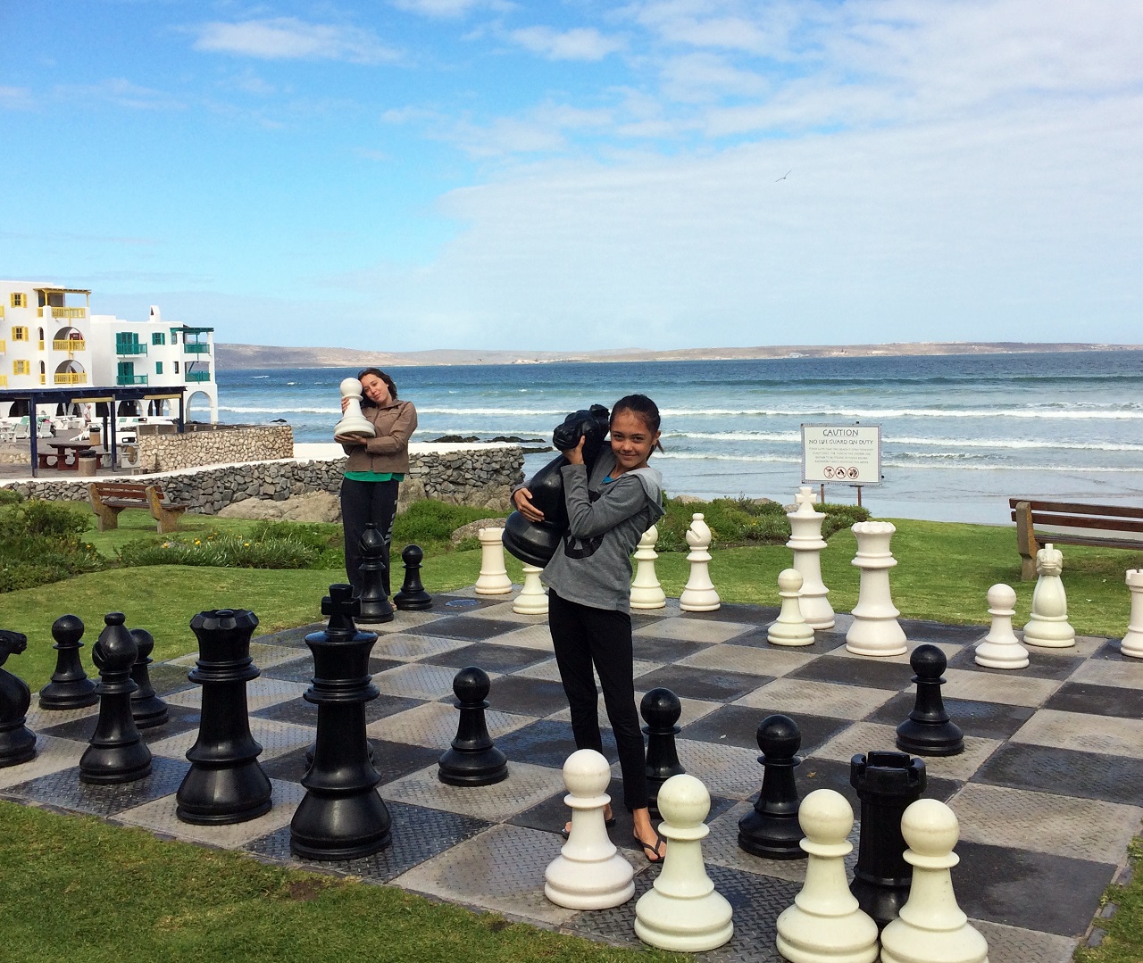 Kids playing giant chess