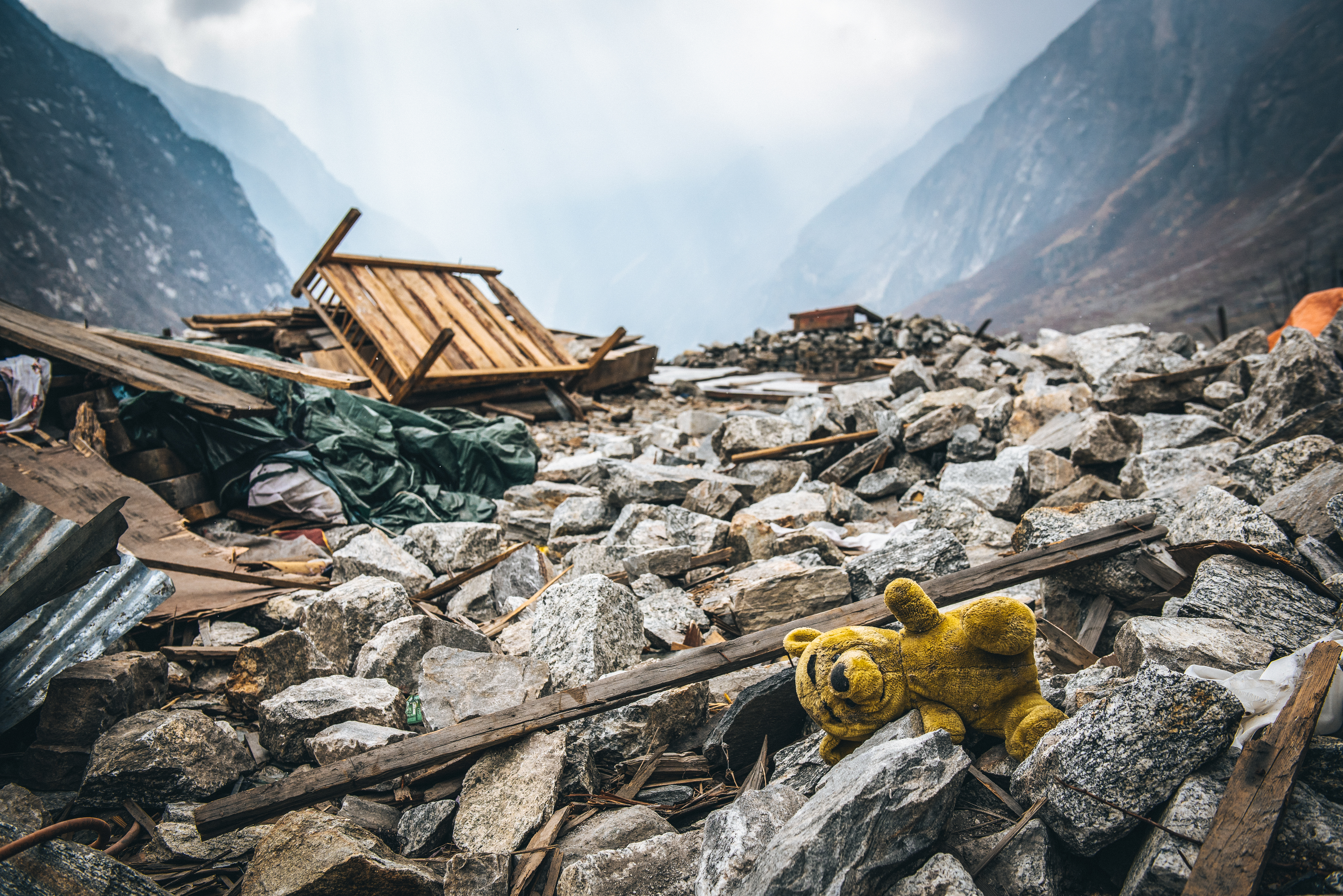 Winnie the pooh sits amongst earthquake devastation - Langtang Valley.
