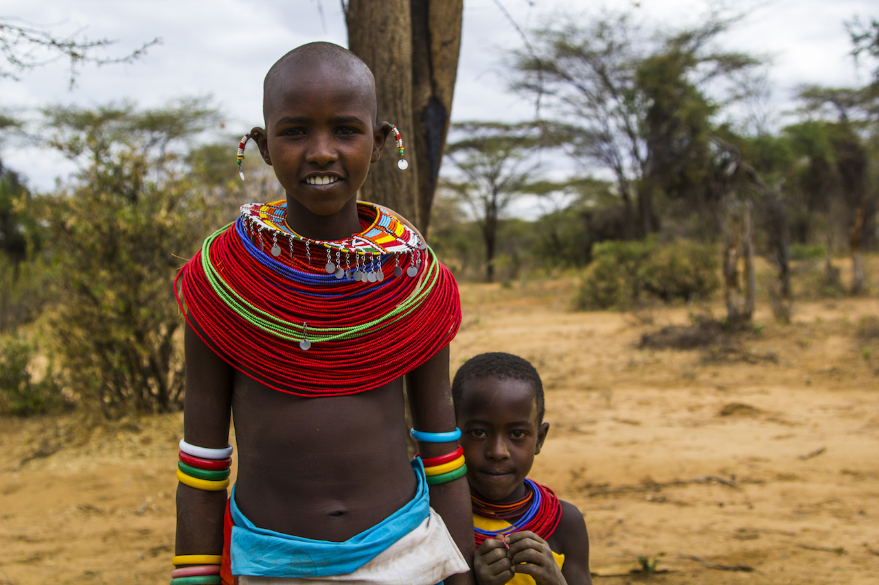 The Samburu tribe inhabits Kenya’s northern plains and is traditionally made up of nomadic pastoralists. Our trip was full of giggling children - from the four naked young boys who scrambled out of a swimming hole as we approached to the kids who followed us for ten minutes at a safe distance before realizing we could be friends and then suddenly were at our side, pulling on our arms eagerly. Photo by author.