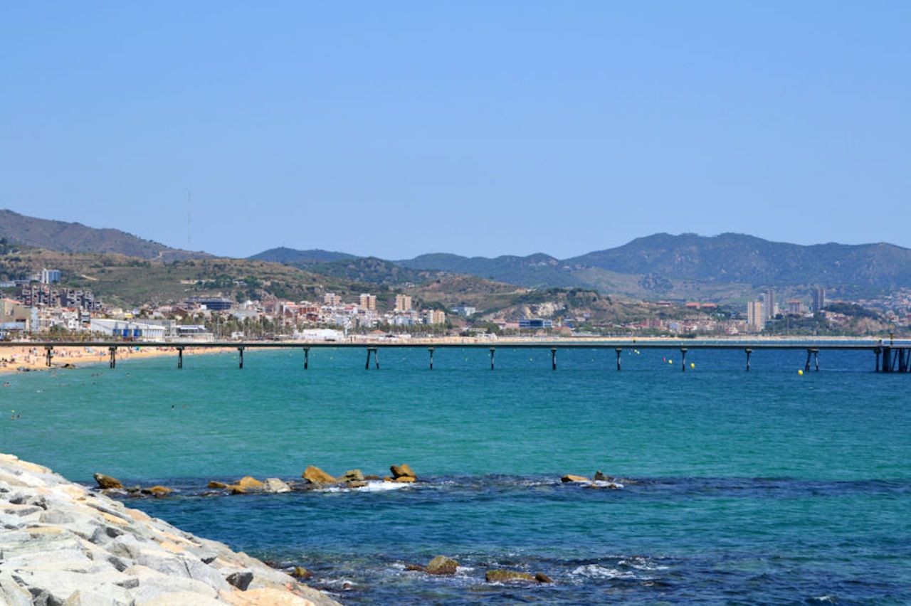 View of Badalona Beach and Pont del Petroli in Catalonia, Spain