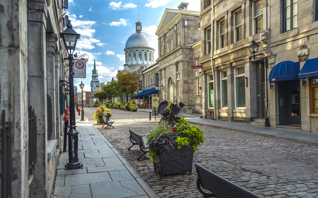 Cobbled streets in Montreal under blue skies