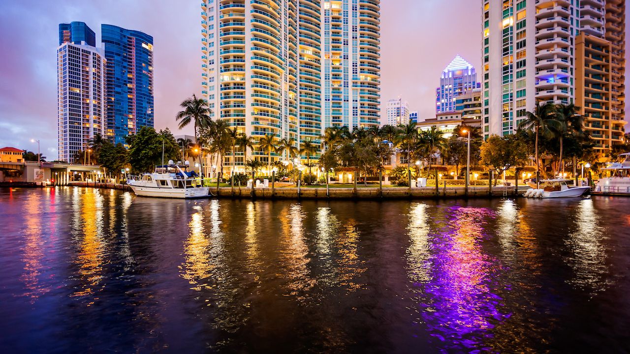 Fort Lauderdale skyline at night along New River one of the best girls trip ideas in the US