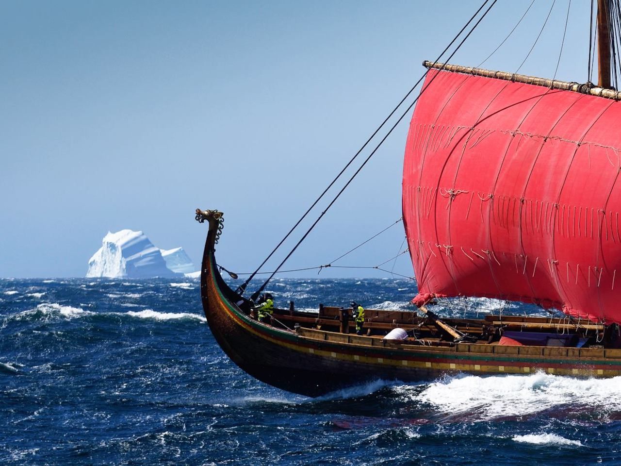 World's largest Viking ship sailing past glacier