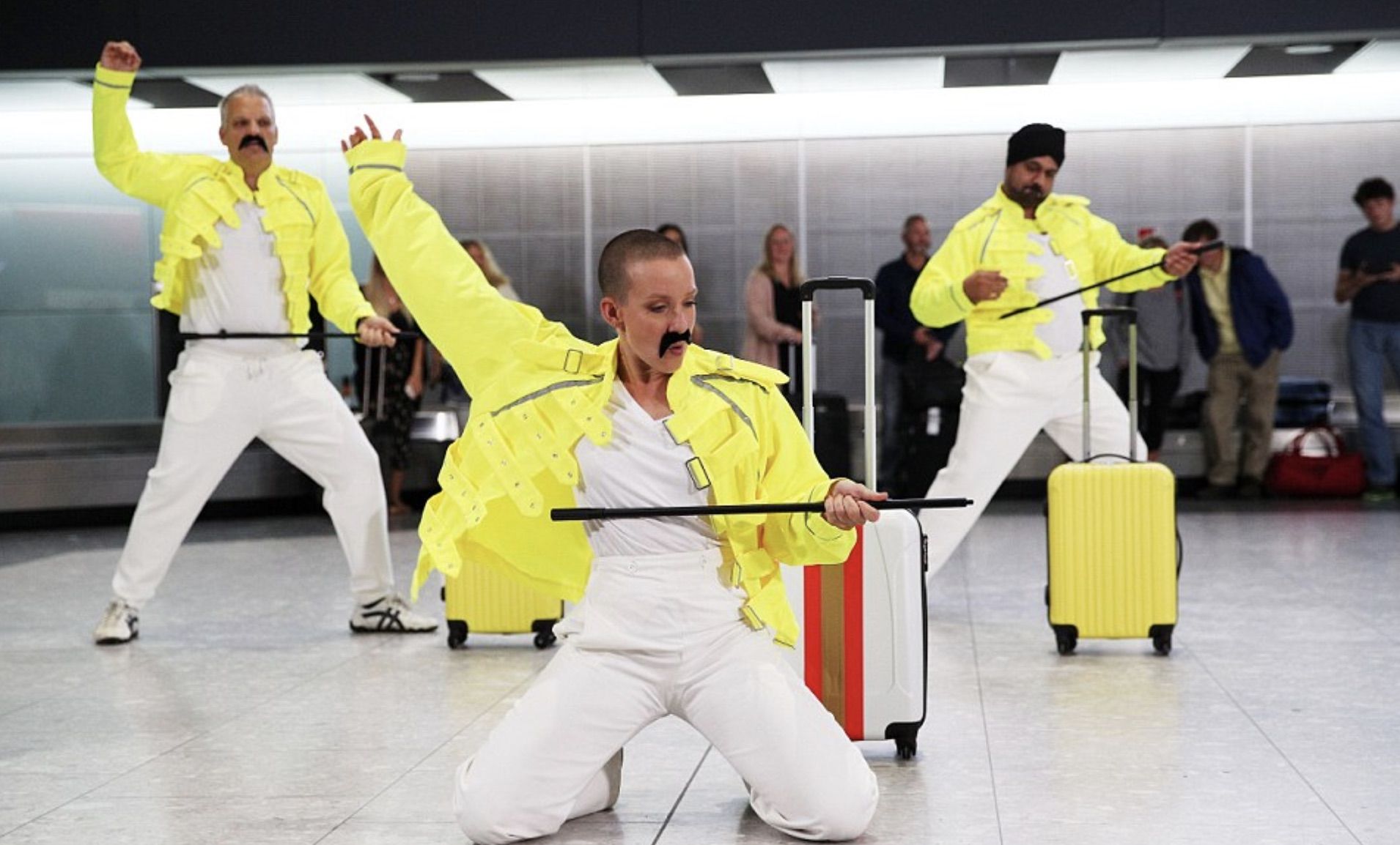 Baggage handlers at Heathrow in London celebrating Freddie Mercury