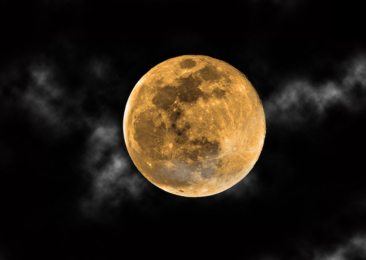orange-harvest-moon-and-clouds-against-black-sky--1200x853.jpg