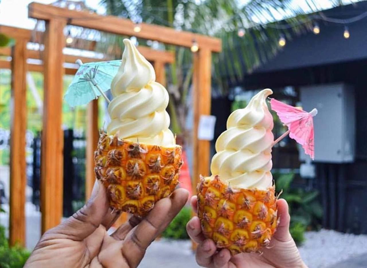 Pineapple soft serve in a baby pineapple