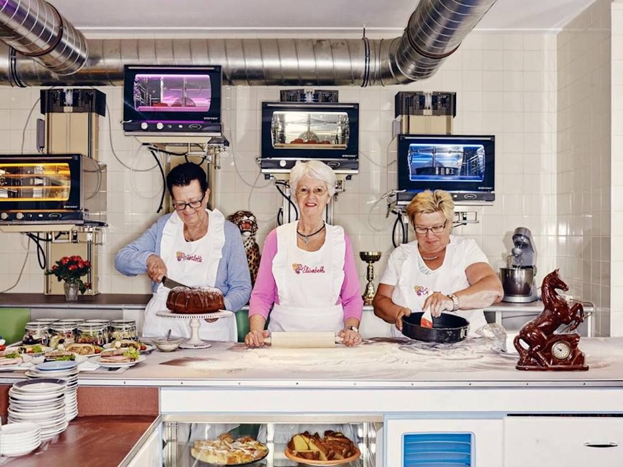 Grandmas working behind the counter at the Vollpension cafe in Lisbon
