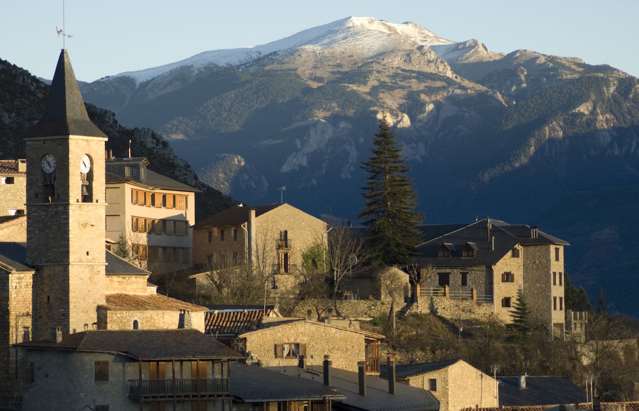 Prullans of Cerdaña with snowy mountain in the background