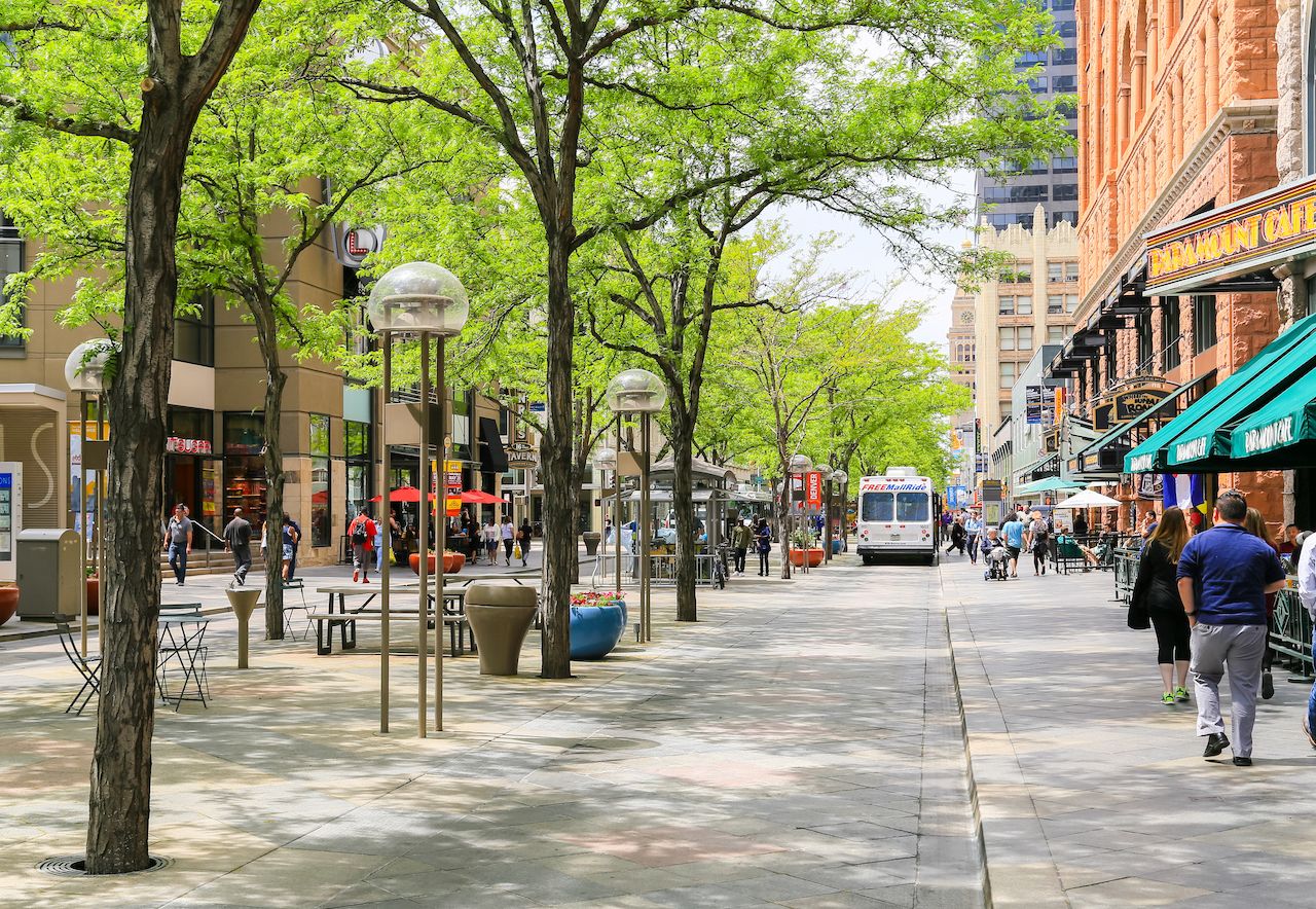 The 16th street mall in downtown Denver with shops and cafes