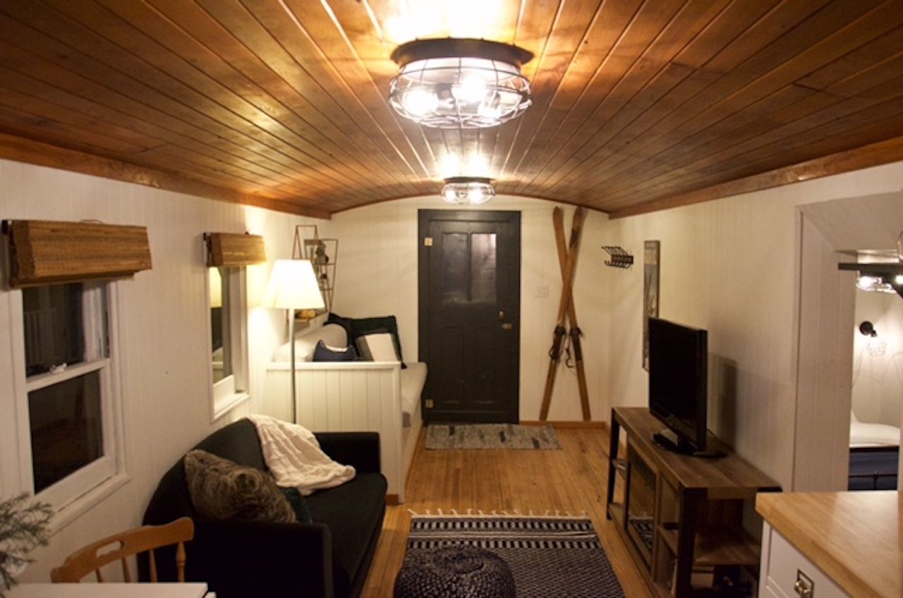 Inside a train cabin converted into cozy accommodation