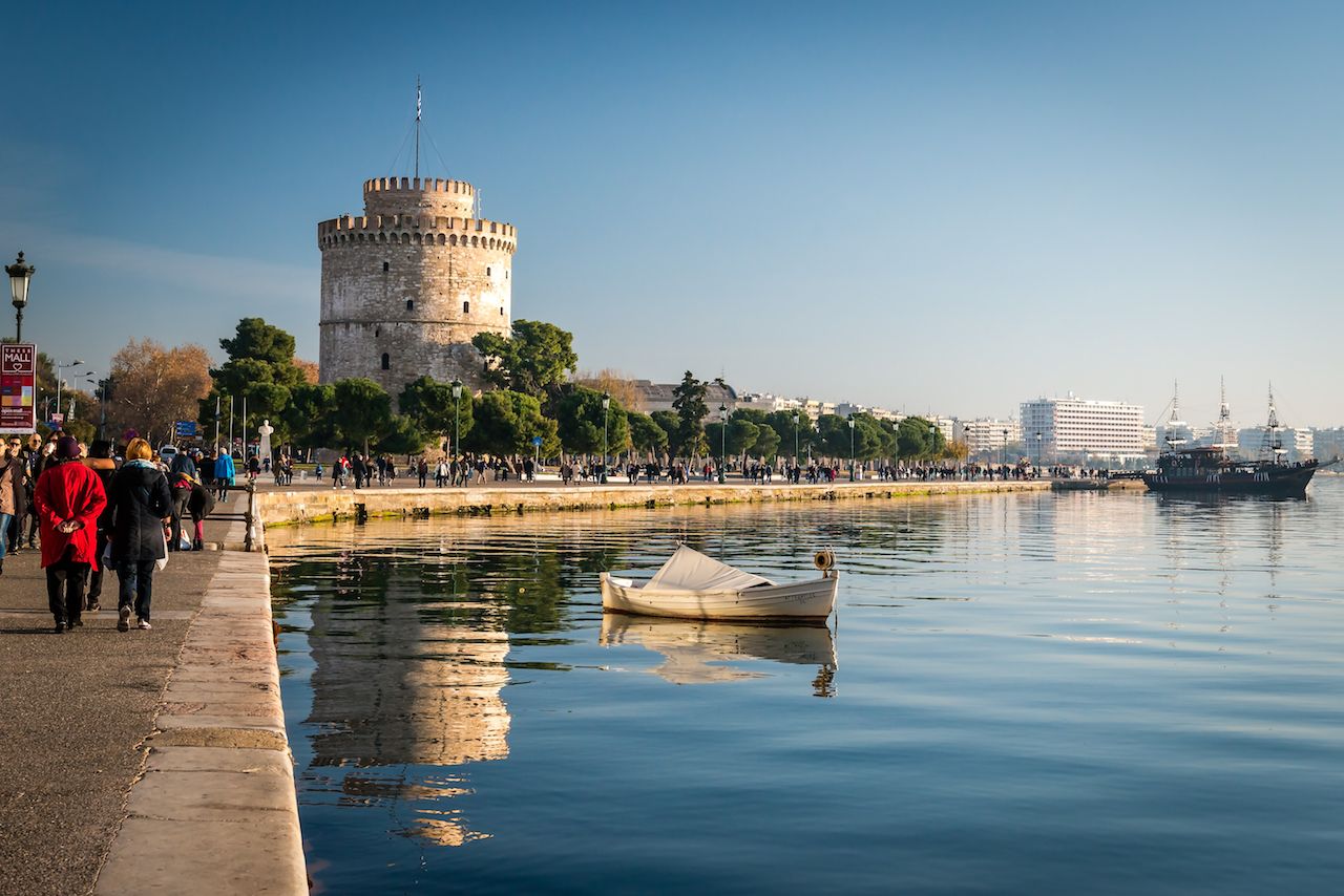 People walking on the coast in Thessaloniki, Greece