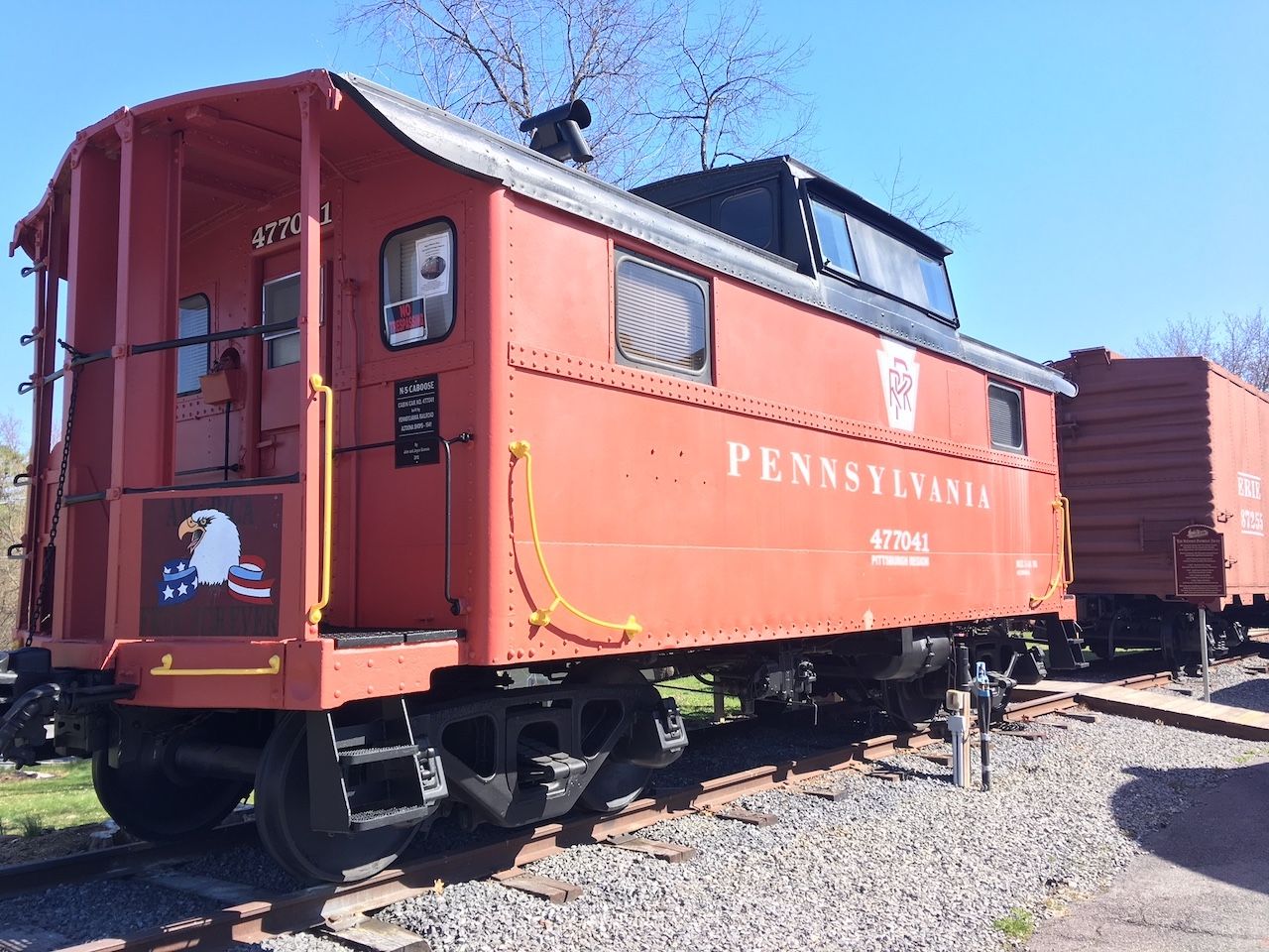 Red train car turned Airbnb on train tracks