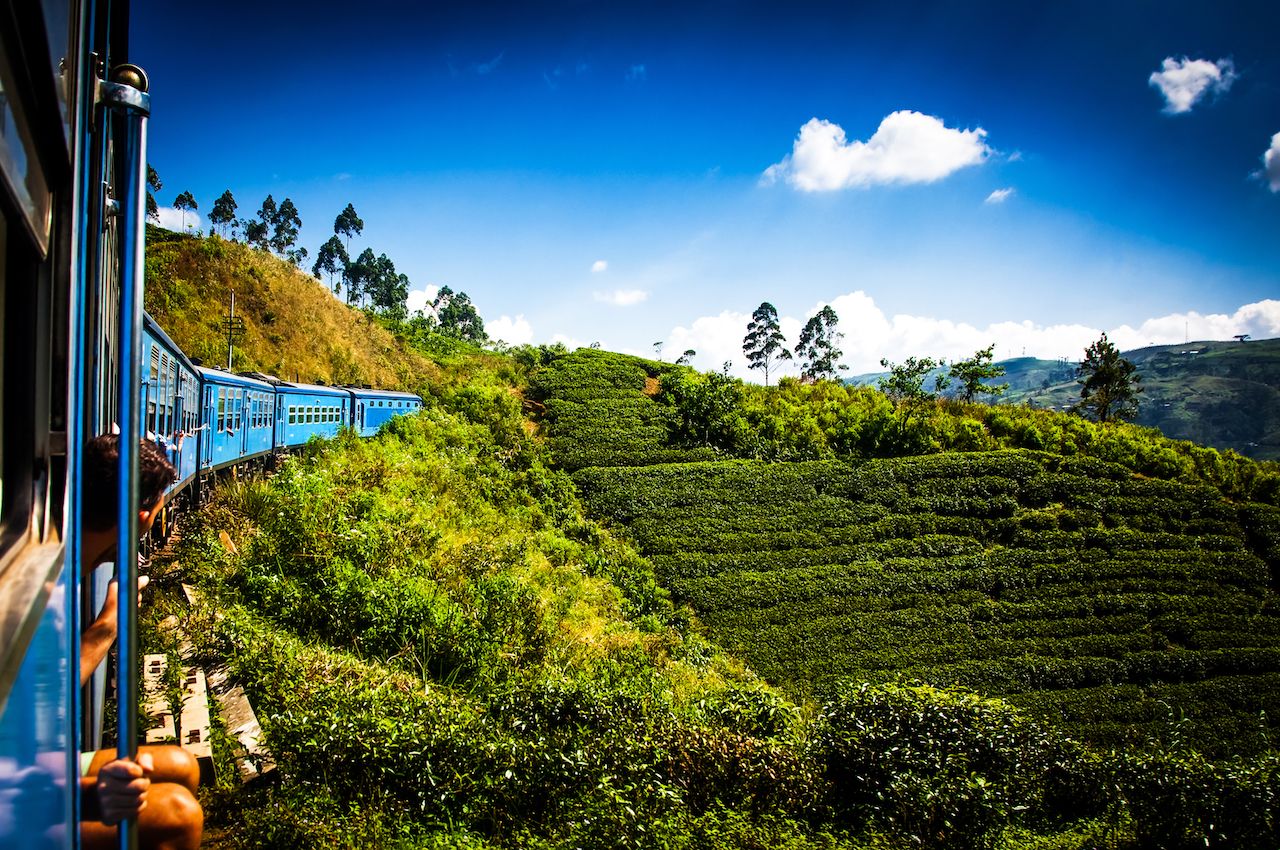 train from Nuwara Eliya to Kandy among tea plantations in the Highlands of Sri Lanka