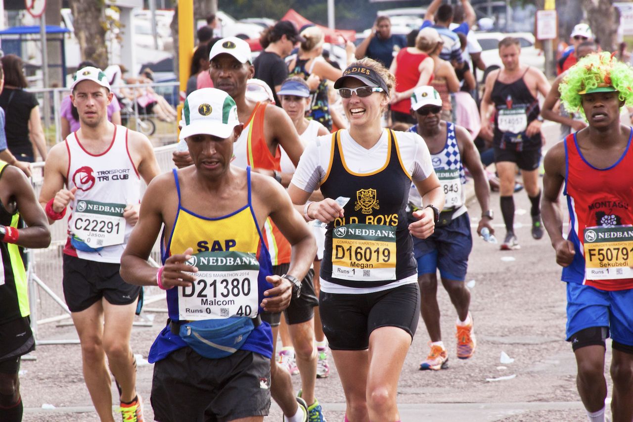 Many runners compete in the long distance Comrades Ultra Marathon