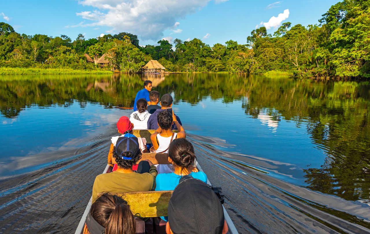 Transportation in canoe along the rivers of the Amazon River Basin inside the Yasuni National Park, Ecuador