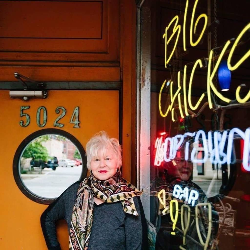 Woman standing outside the Big Chicks LGBTQ bar