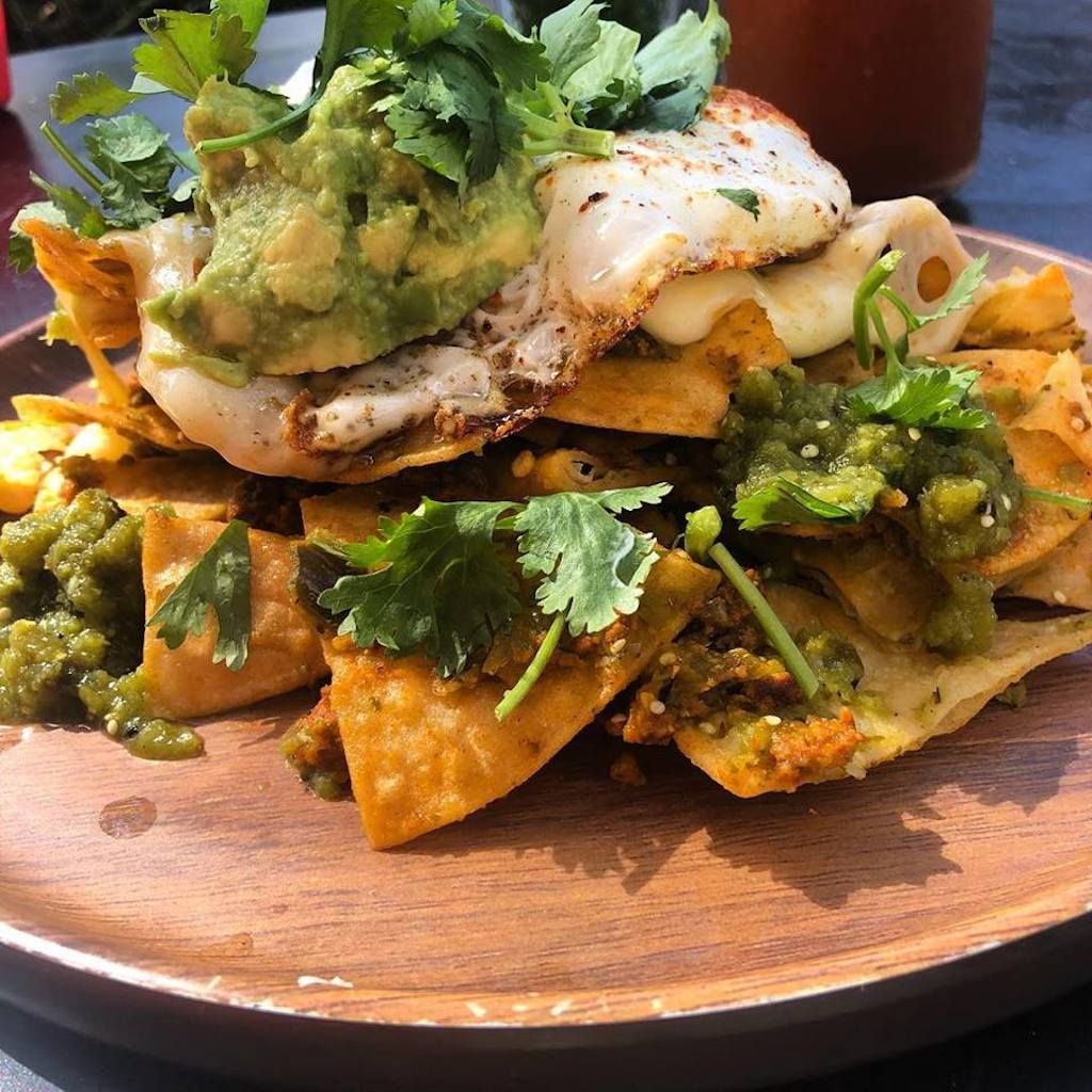Chilaquiles with chorizo and guacamole