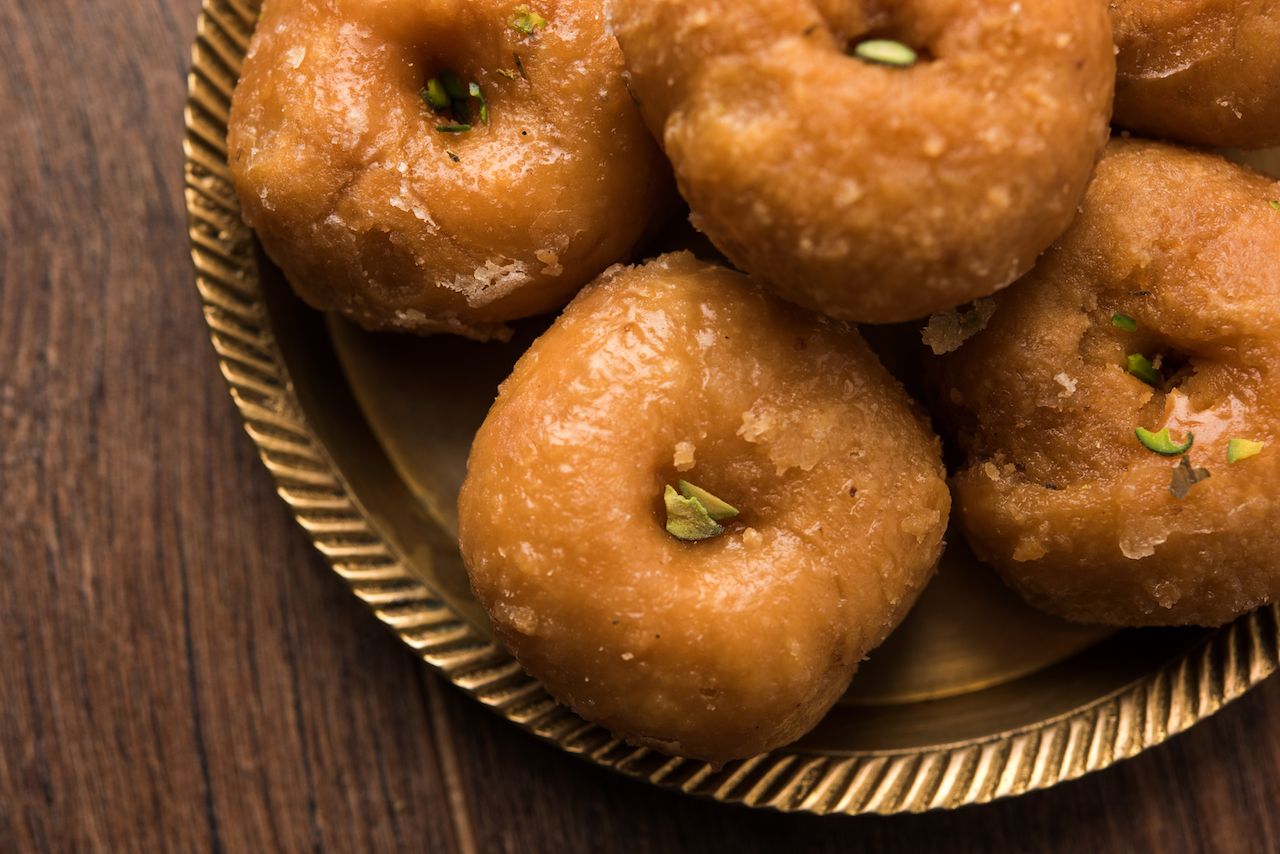 Balushahi Indian donughts served on a golden plate