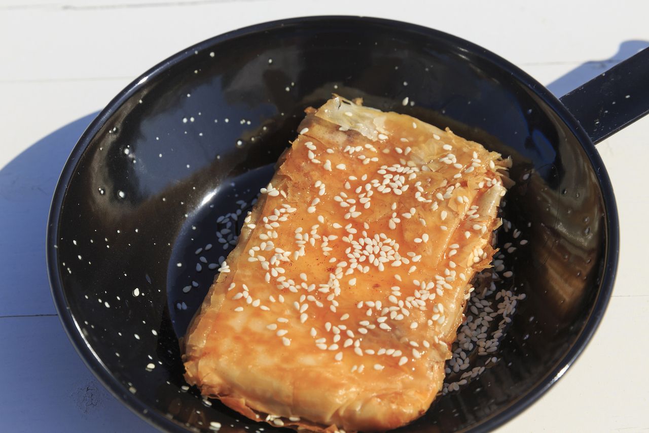 Phyllo wrapped feta cheese appetizer with honey and sesame seeds