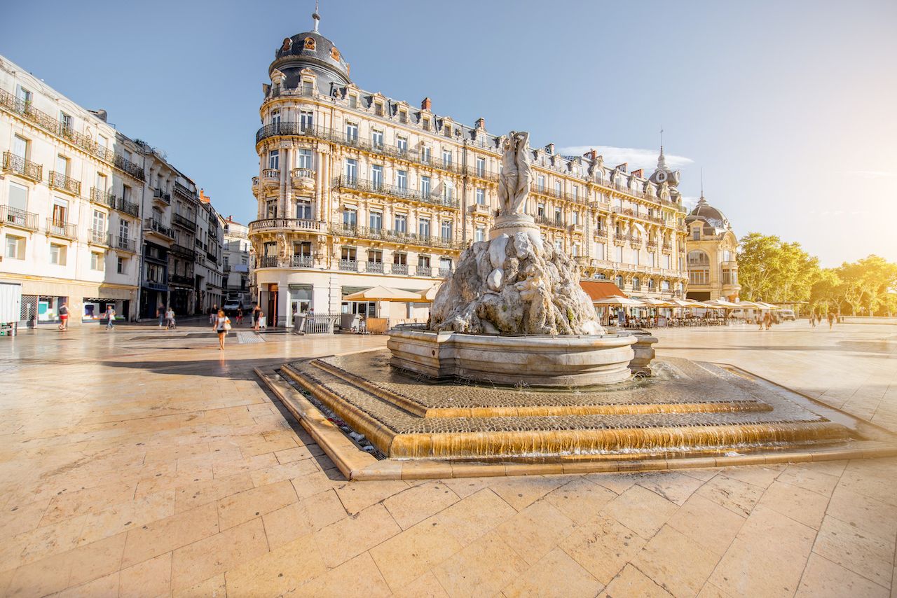 The Comedy square with fountain of Three Graces during the morning light in Montpellier city in southern France