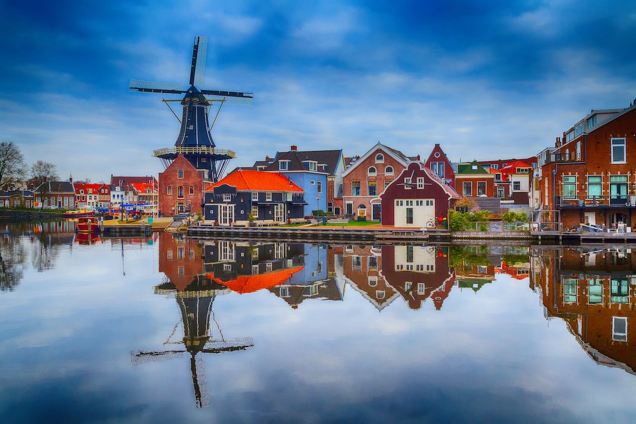 Windmill and traditional houses in Haarlem, Holland, Netherlands