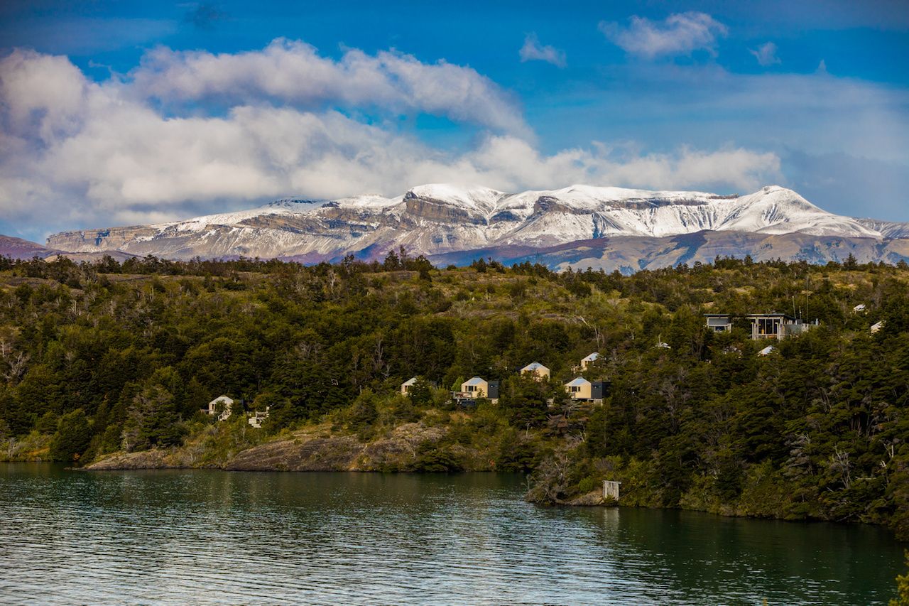 Glamping setup in Patagonia between mountains and water