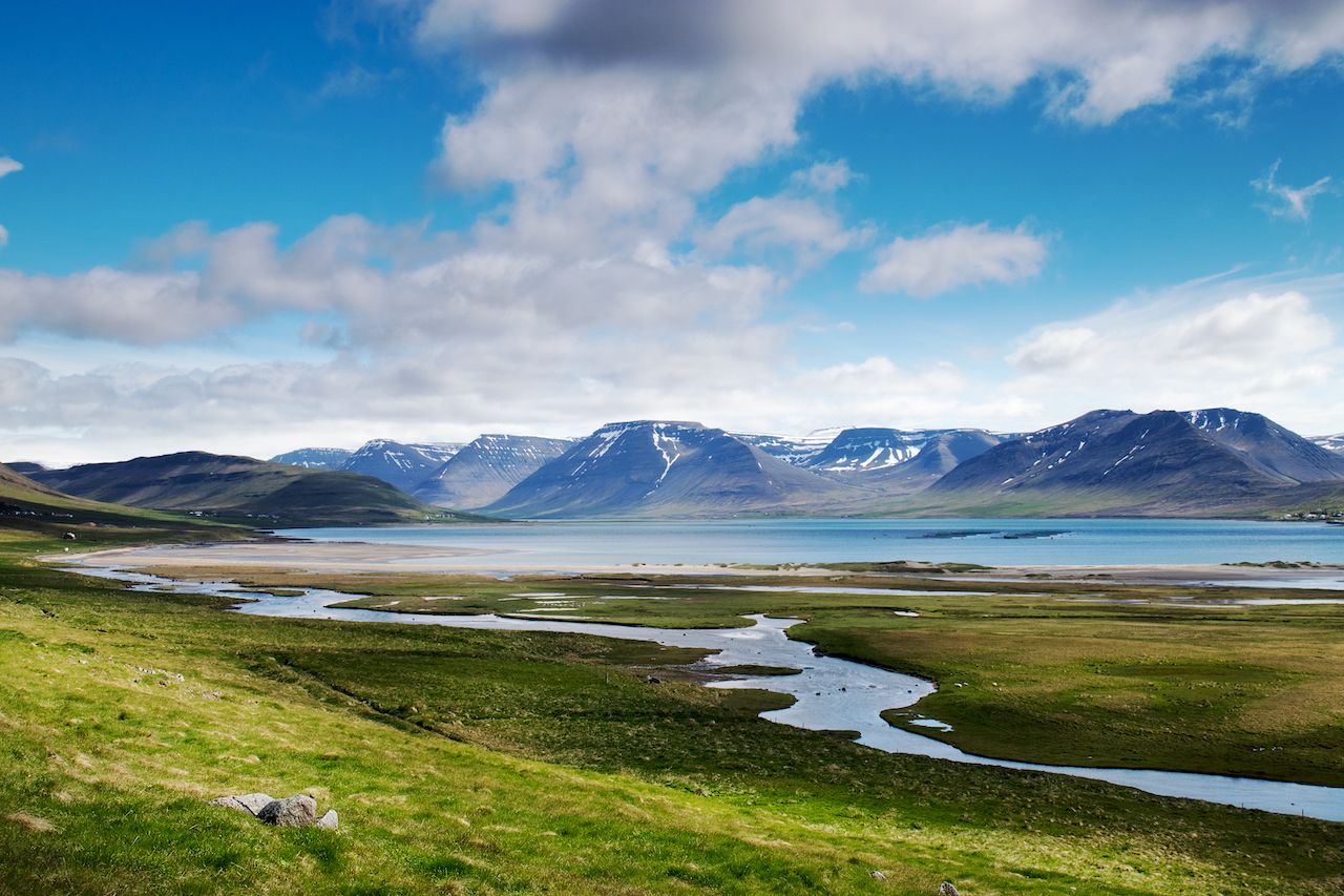 Green, mountainous landscape of Thingeyri, Iceland