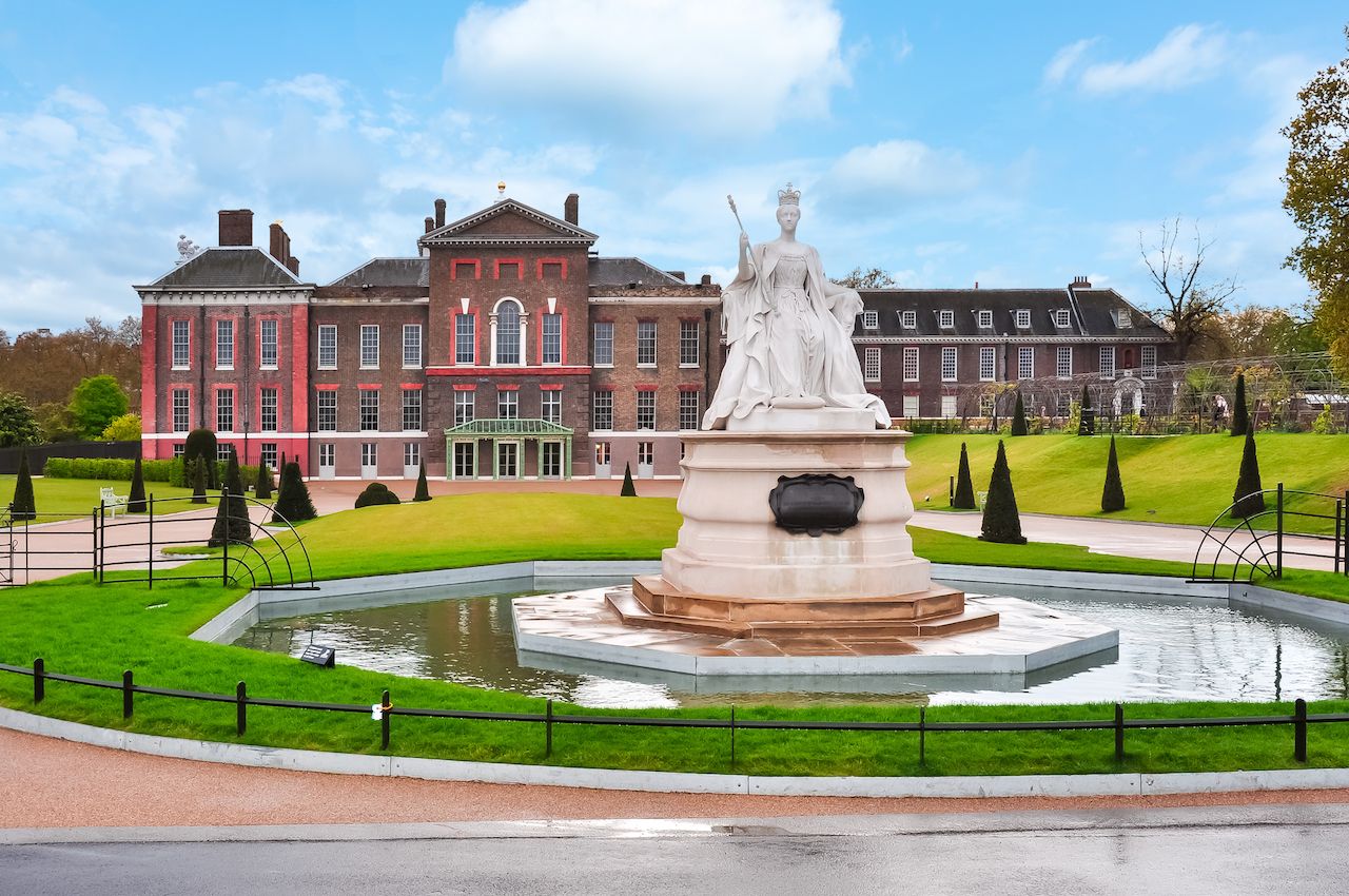 Kensington Palace and Queen Victoria Monument in London, UK