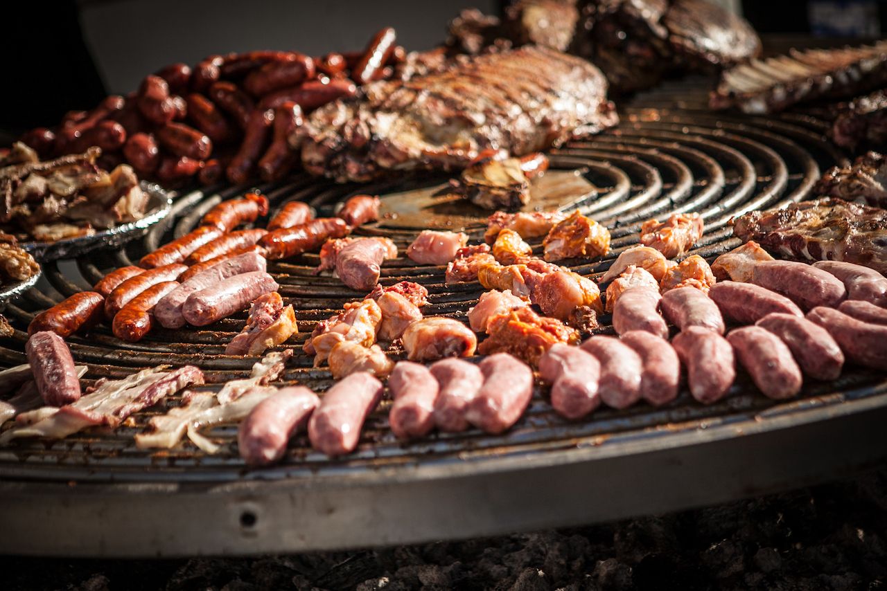 Massive outdoor barbecue with grilled meats in Argentina