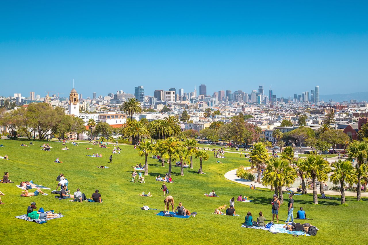 People enjoying the sunny weather in Mission Dolores park
