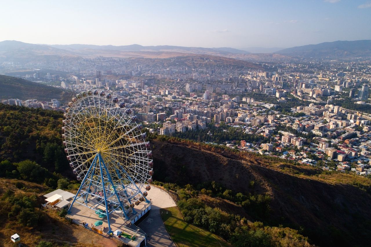 The Ferris wheel in Tbilisi. Against the background of the city