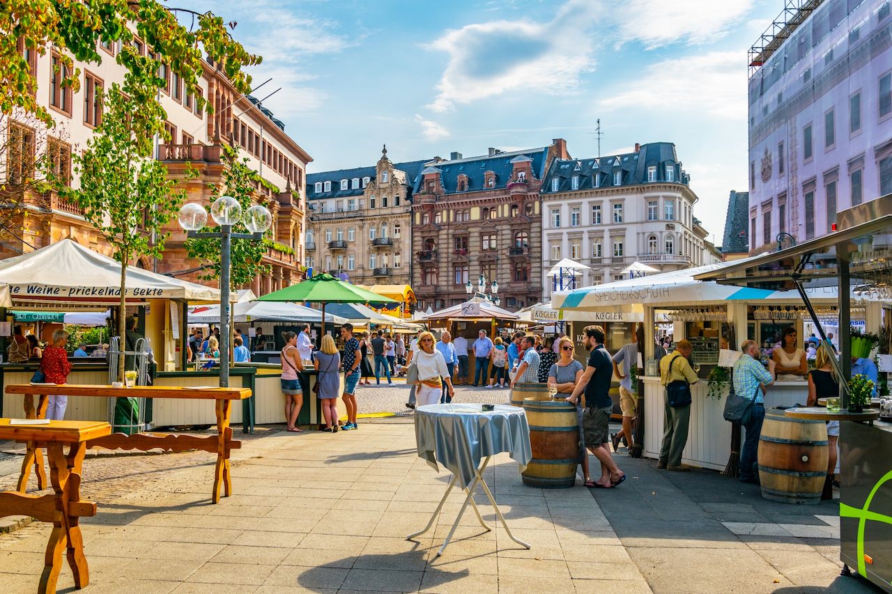 Tourists are strolling on marktplatz in the center of Wiesbaden, Germany