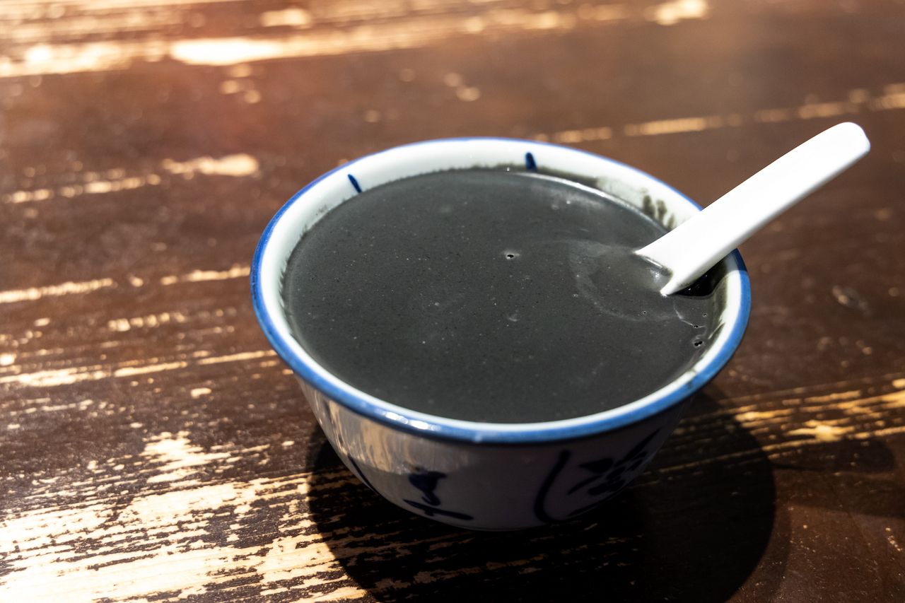 A bowl of black sesame soup, a popular Chinese dessert