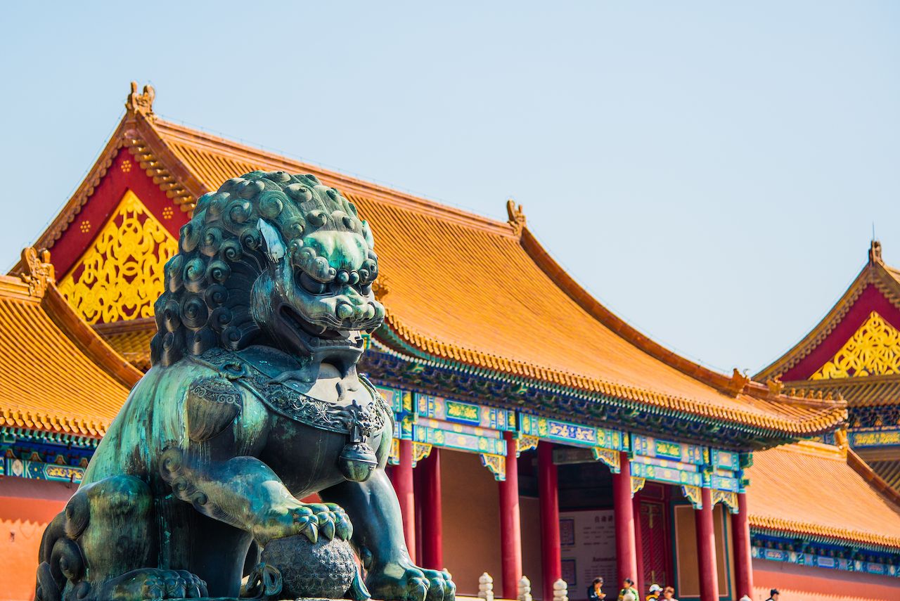 A gilded lion in front of the Hall of Mental Cultivation in forbidden city