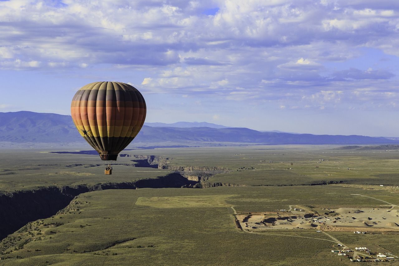 Hot air balloon flying over the Rio Grande Gorge, New Mexico