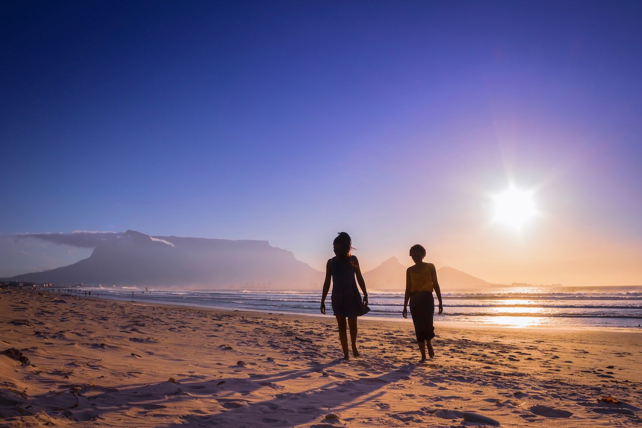 Two people on a beach in South Africa