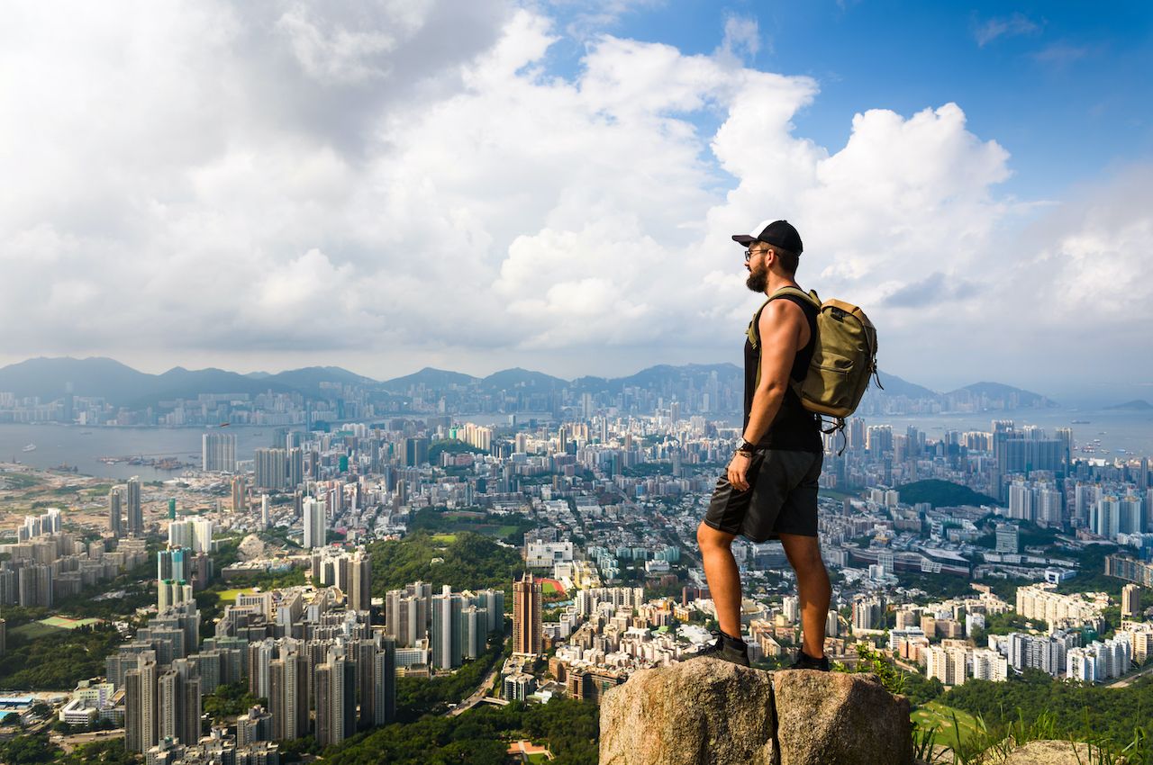 Person looking at view of Hong Kong