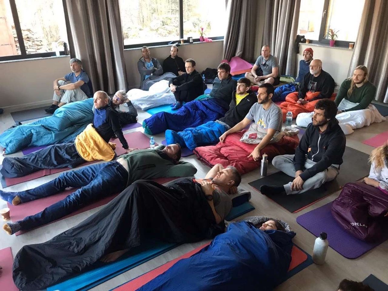 group in sleeping bags on Wim hof retreat