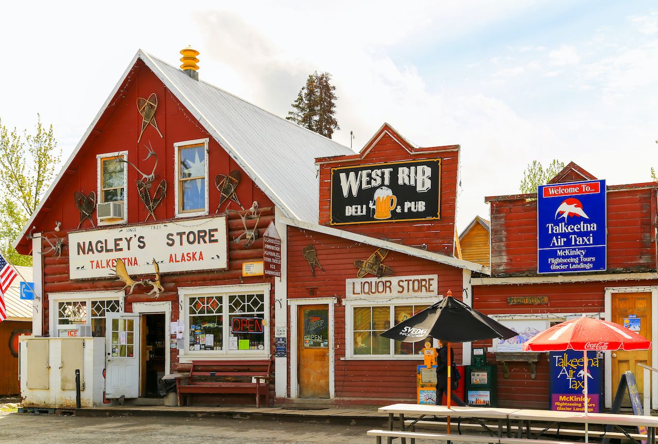 Facade of stores and pubs in the small oldtown of Talkeetna, Alaska