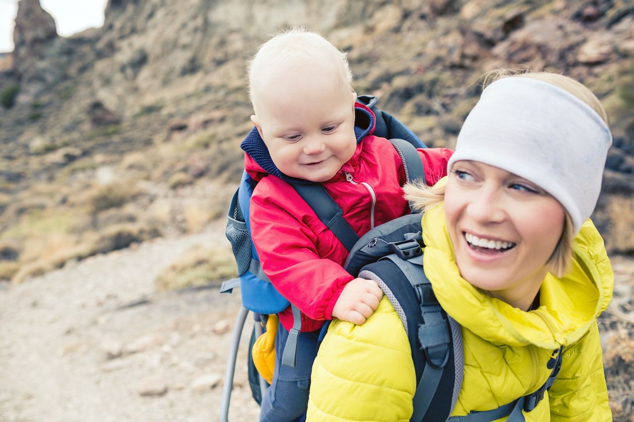 Mom carrying outlet baby