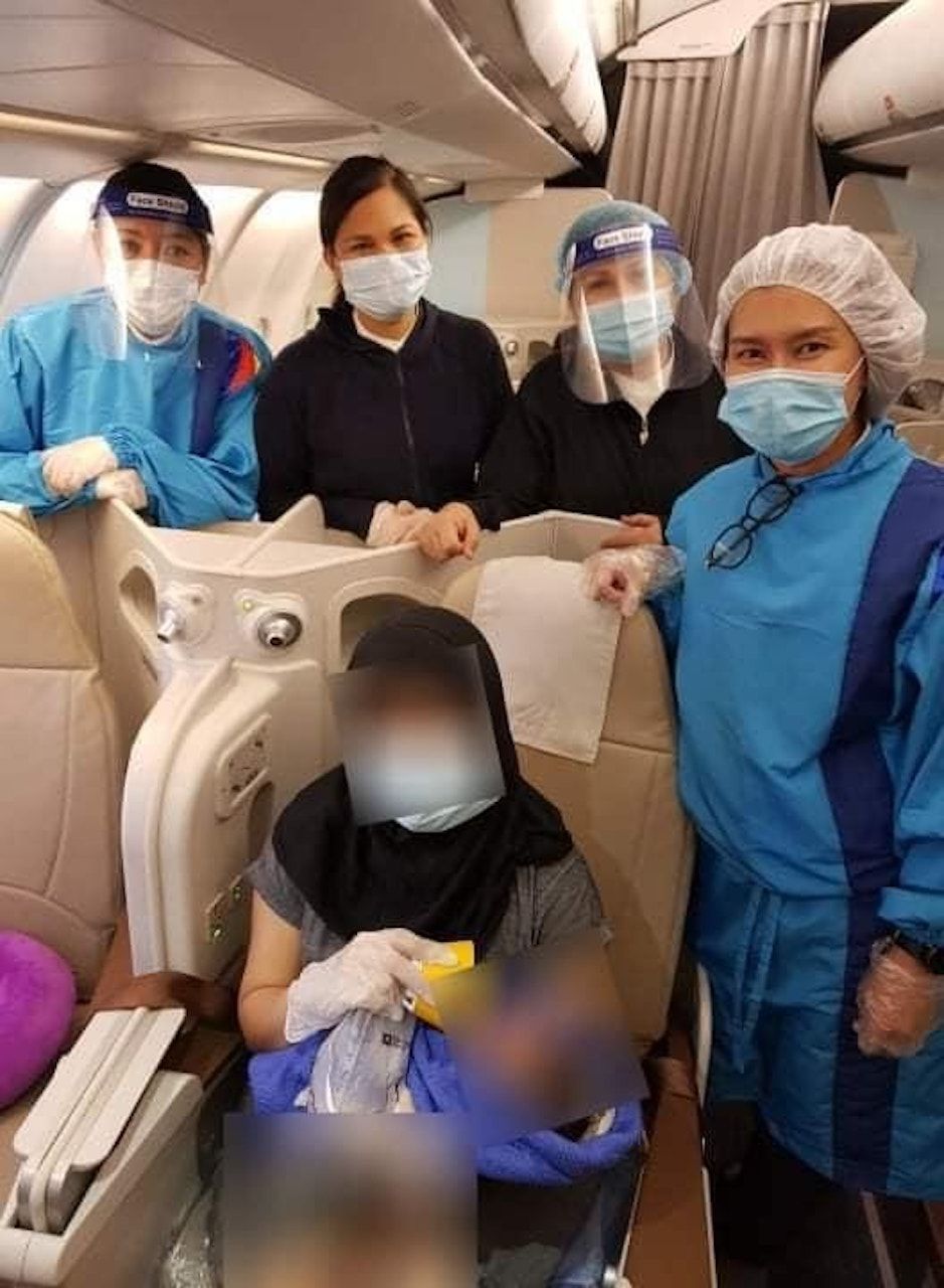 Philippine Airlines Attendants Help Woman Give Birth In Flight