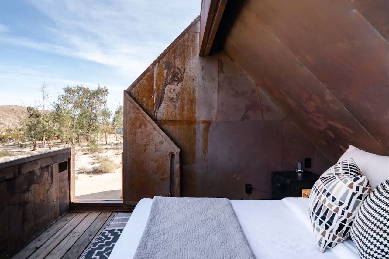Outdoor bedroom in tiny house in Twentynine Palms California